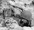 Soldier uses an EE-8 field telephone