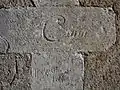 Inscriptions diverses gravées sur le mur extérieur de l'église Saint-Pierre de Granchain (face Sud)