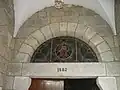 Tympan du portail d'entée dans la nef