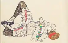 Dessin d'une femme couchée jambes repliées en triangle, en chaussure, bas noirs et dessous blancs avec rubans de couleur