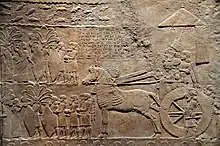 Assurbanipal sur son char.
