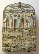 Stèle, bois peint. Dame Meresimen, chanteuse de la résidence d'Amon, en prière devant Osiris et les quatre fils d'Horus, v. 690-655.Louvre