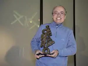 Emmanuel Guibert avec le prix Goscinny