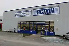 Magasin Action de Bernay, un panneau indique quelques familles de produits.