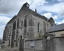 Façade ouest, clocheton, mur sud et presbytère.