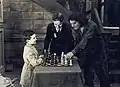 Reshevsky jouant contre Fairbanks aux côtés de Chaplin (1921)