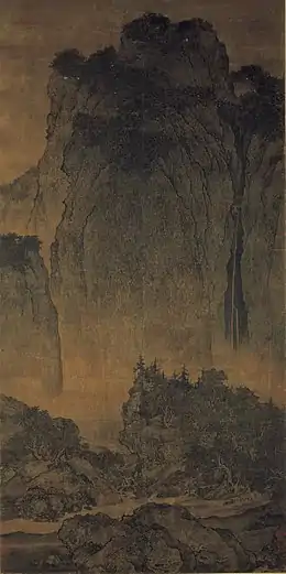 Voyageurs au milieu des Montagnes et des Ruisseaux (谿山行旅. Fan Kuan (Fan K'uan) (990–1020), Dynastie Song. Encre et légère couleur sur soie. 155,3 × 74,4 cm.