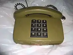 Téléphone à numérotation par impulsions (modèle Keyfob FeTAp 751 de 1982).