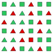 Quadrillage de carrés et de triangle rouges et verts, ne comptant qu'un seul carré rouge.