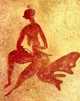 Photo en couleurs d'une gravure d’une femme peinte en ocre sur fond jaune.