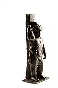 Statuette en bronze de Attis avec ses attributs: lièvre et bâton de berger, A.D. 75-150, trouvée à Tongres (Belgique), Musée gallo-romain (Tongres)
