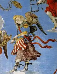 Image au centre  d'un ange ailé jouant du tambourin avec un long vêtement coloré sur un fond bleu.