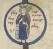 Lettrine O représentant un homme richement vêtu portant une couronne et un sceptre.