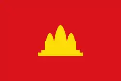 Un rectangle rouge avec en son centre un temple jaune à trois dômes.