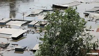 Les villages de la rive gauche du Dniepr, sous occupation russe, sont sous l'eau après la rupture du barrage de Kakhovka le 6 juin 2023.
