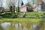 L'église se mirant dans l'étang.