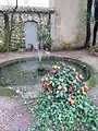 Fontaine du jardin de l'hôtel d'Olivary (avec jet d'eau), rue Goyrand