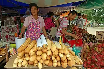 Vendeurs de rue (Laos).