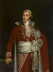 Portrait de Fouché en pied, la tête tournée vers la droite, la main appuyée sur une balustrade. Il est vêtu d'un habit somptueux, rouge et or.
