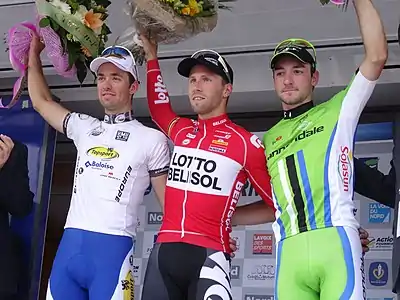 Podium de l'édition 2014 du Grand Prix de Fourmies : Tom Van Asbroeck (2e), Jonas Van Genechten (1er) et Elia Viviani (3e).