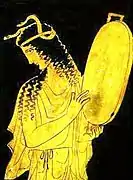 Image d'une femme de l'Antiquité grecque jouant de la musique.