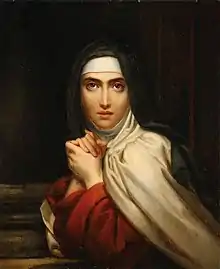 Tableau représentant sainte Thérèse en clair-obscur, regardant le spectateur, les mains jointes.