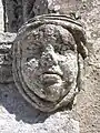 Mascaron du portail de l'église Saint-Cyr-et-Sainte-Julitte.