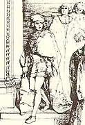 Portrait d'un homme se tenant debout et portant costume et chapeau.