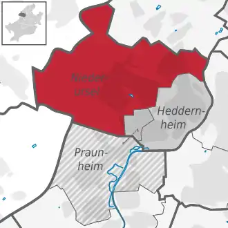 Carte situant le quartier (en rouge) au sein l'arrondissement (en gris foncé) et du reste de la ville (en gris clair)