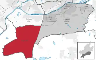 Carte situant le quartier (en rouge) au sein l'arrondissement (en gris foncé) et du reste de la ville (en gris clair)