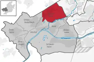 Carte situant le quartier (en rouge) au sein l'arrondissement (en gris foncé) et du reste de la ville (en gris clair)