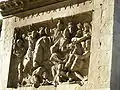 Fragment de la Grande Frise de Trajan réemployé sur l'Arc de Constantin.