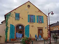 Fresque d'Éric Haven, place du Marché.