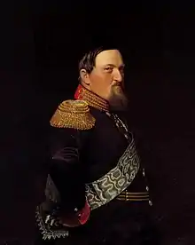 tableau : portrait d'un gros homme barbu, de profil, en grand uniforme