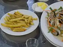 Frites servies avec du beurre et du sucre à Hô Chi Minh-Ville.