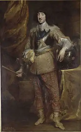 Portrait en pied d'un homme vêtu en cuirasse, col et manchettes de dentelle.