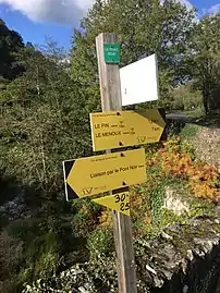 Le panneau directionnel au « Pont Noir » en 2017.