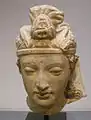 Tête de bodhisattva. Hadda. IVe ou Ve siècle. National Gallery of Victoria - Asian art. Melbourne, Australie.