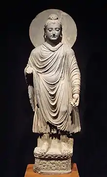 Le Bouddha portant des robes kāṣāya, vers 200 av. J.-C.