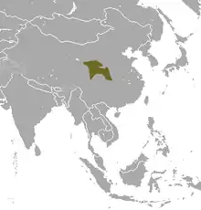 Carte d'Asie avec un tache verte au centre de la Chine, un peu à droite.