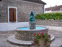 La fontaine.