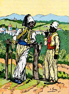 Deux soldats noirs, celui de gauche appuyé sur une barrière, coiffé d'un haut bonnet blanc et vêtu d'un gilet blanc par-dessus un habit vert avec un pantalon ample blanc, et celui de droite avec des vêtements similaires.