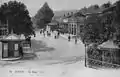 Place de la gare et bâtiment voyageurs vers 1900