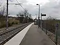 La gare d'Alaï, vue vers le sud. A gauche de la voie, l'arrière des jardins des villas de la rue de l'Abbé-Papon.