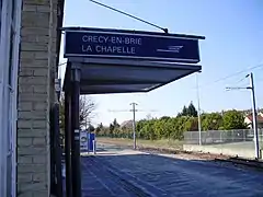 Panneau avec inscrit Crécy-en-Brie - La Chapelle.