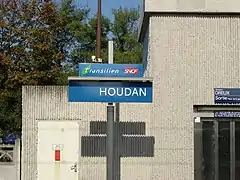 Panneau indiquant le nom de la gare.