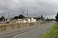 Gare vue du côté des voies, en direction de Rouen et de Montérolier - Buchy.