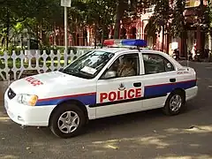 Patrouille de police à Madras (en).