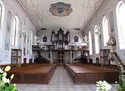 Vue intérieure de la nefvers la tribune d'orgue.