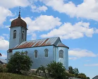 Église de Gellin, avec son clocher comtois caractéristique.